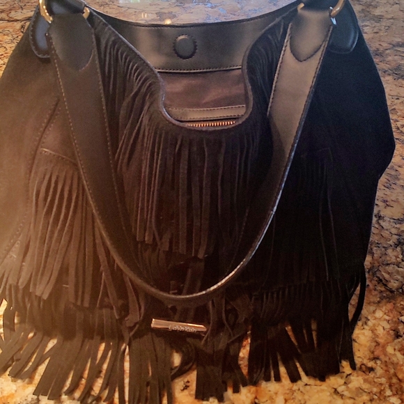 Calvin Klein black "leather" fringed shoulder bag preowned good cond inside out. - Picture 13 of 16
